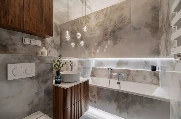 Large-format tiles with decorative interlocking add character to the arrangement
