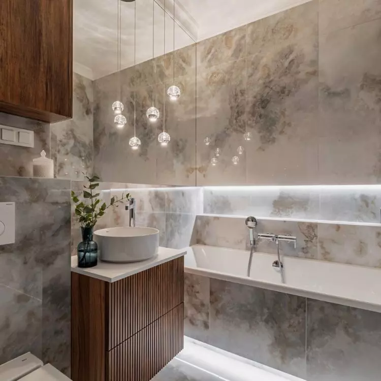 Large-format tiles with decorative interlocking add character to the arrangement