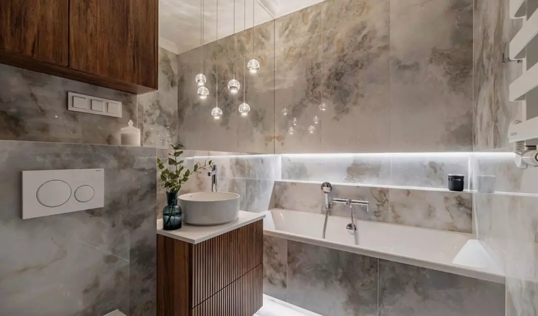 Large-format tiles with decorative interlocking add character to the arrangement