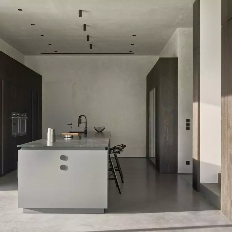Wide island allows for comfortable use of the kitchen