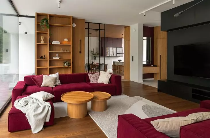 The focal point of the living room is two modular sofas in a strong color