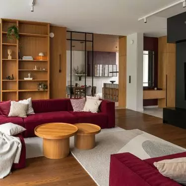 The focal point of the living room is two modular sofas in a strong color
