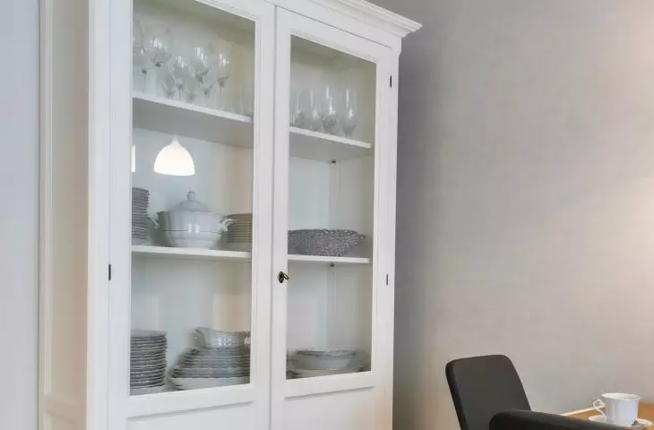 The kitchen is decorated with an English-style sideboard