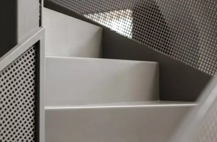 Detail of staircase with metal mesh
