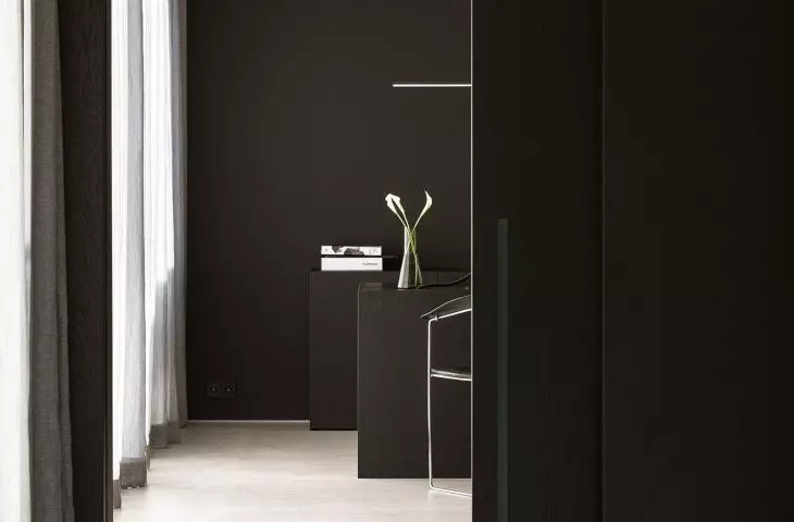 The sliding wall is covered with veneer