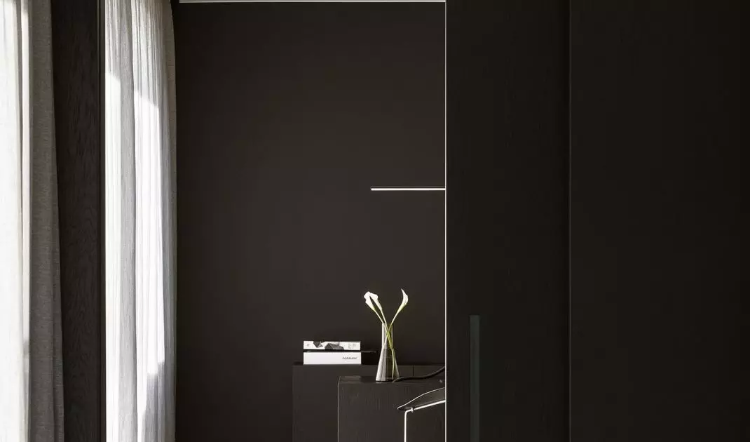The sliding wall is covered with veneer
