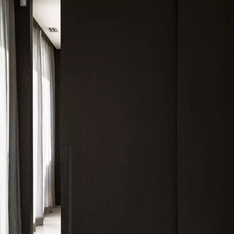 The study was separated from the living room by a movable wall