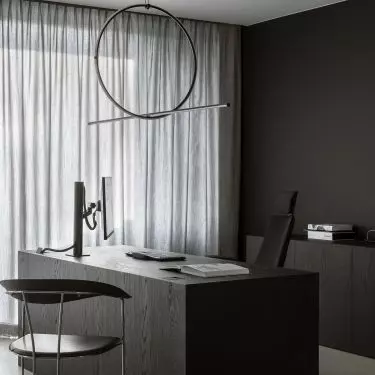 The desk has the form of a monolithic block