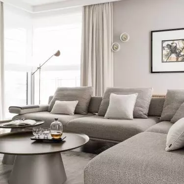 The living room arrangement is more subdued
