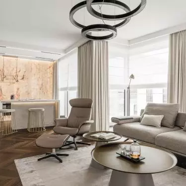 The living area counterbalances the ornate kitchen