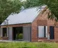 The architect designed the house for his grandfather.