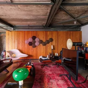 The living area was separated by a colored glass wall
