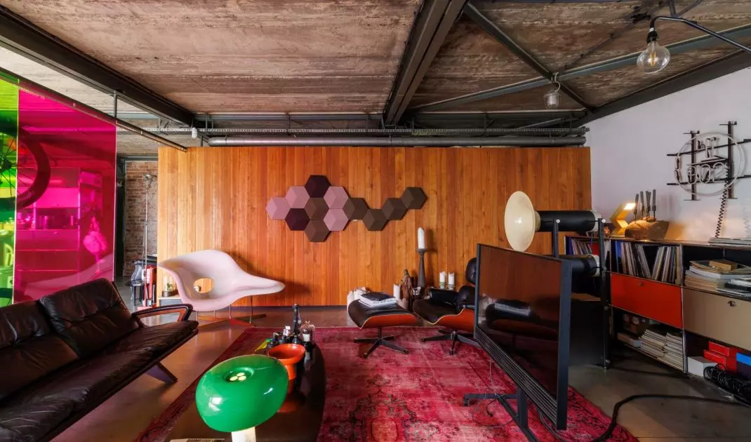 The living area was separated by a colored glass wall