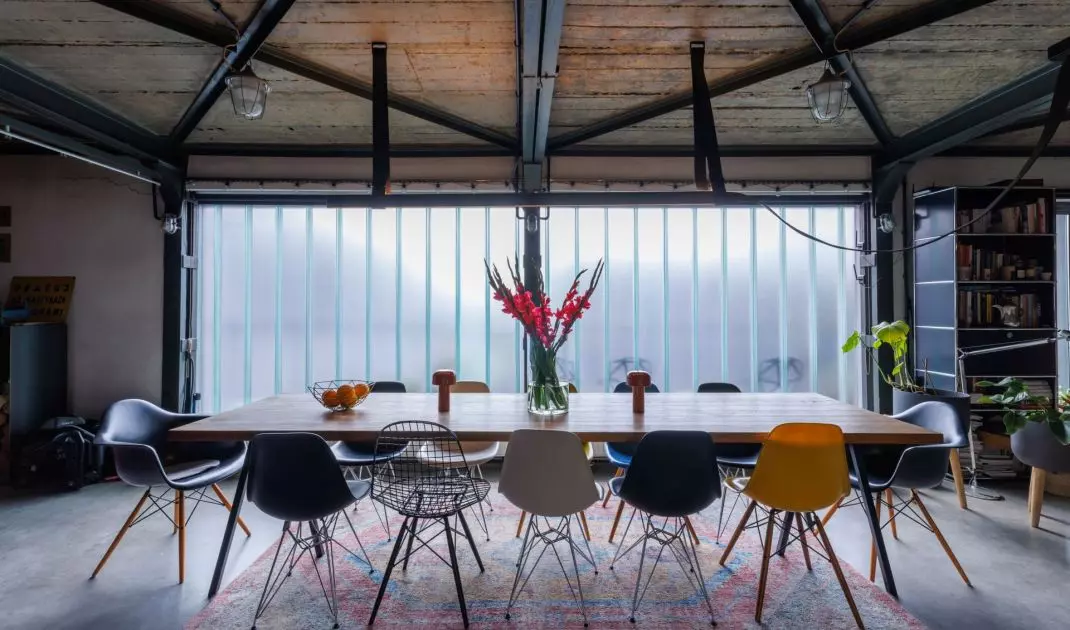 The dining room has a large wooden table