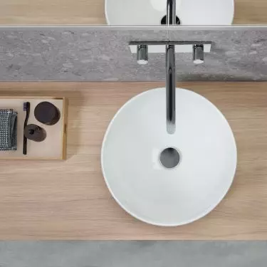 Round washbasin is a classic model that will work well in minimalist arrangements