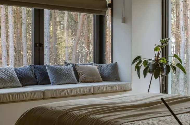 The space under the window was used to create a cozy nook