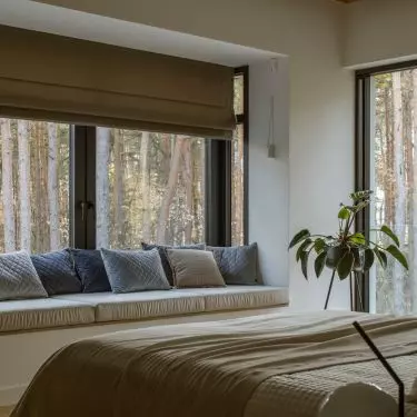 The space under the window was used to create a cozy nook
