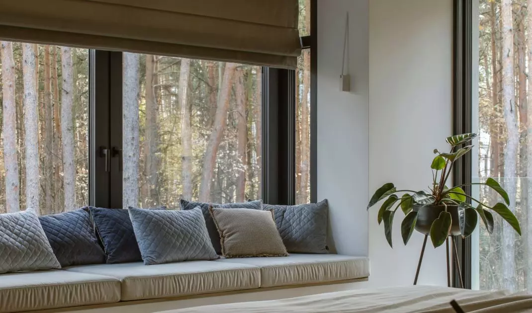 The space under the window was used to create a cozy nook
