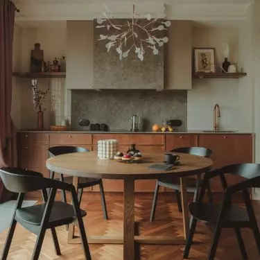 The lighting of the dining area should blend in with the rest of the interior