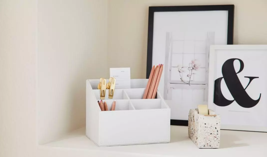 A box for writing accessories is the foundation of a well-organized desk 
