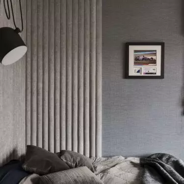 Upholstered panels in son's room are narrow and convex