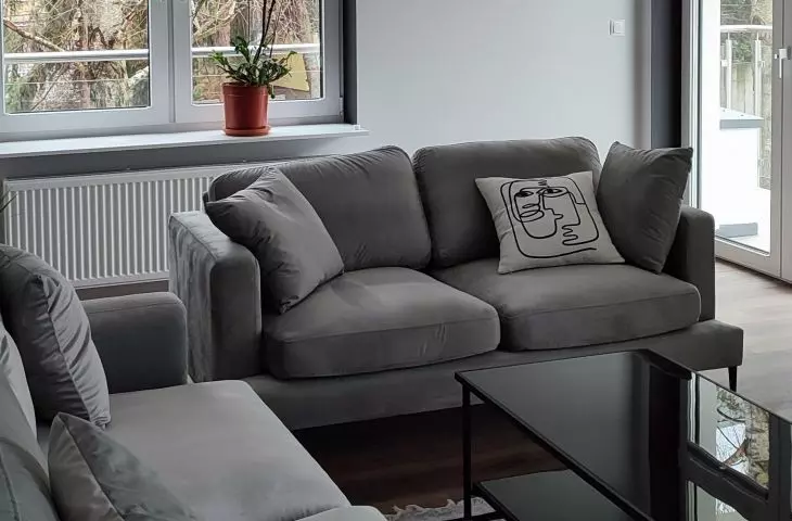 The lounge furniture has been arranged in such a way that the living room is open to the rest of the living area