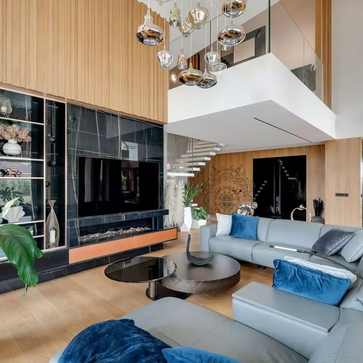 In the lounge area you will find a large gray sofa