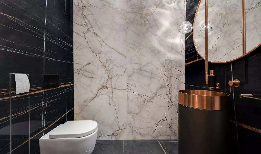 Copper accessories break up the dark color palette
