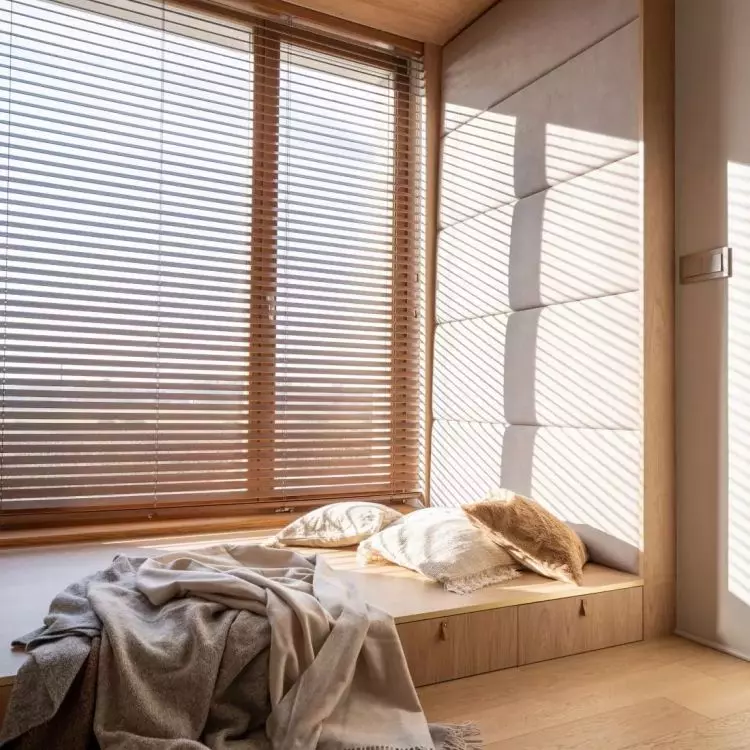 The alcove under the window is a great place for comfortable seating