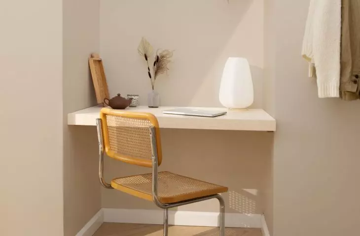 Several shelves placed in an alcove will create a comfortable home office