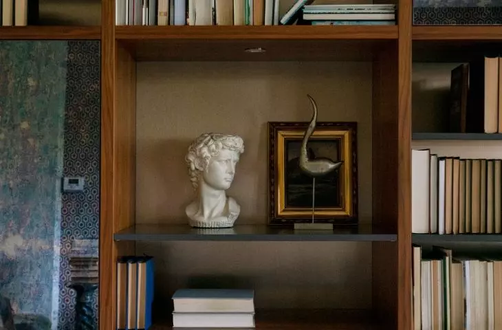 The bookcase was made of MDF veneered with American walnut