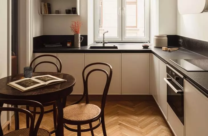 The kitchen has been brought closer to the living room