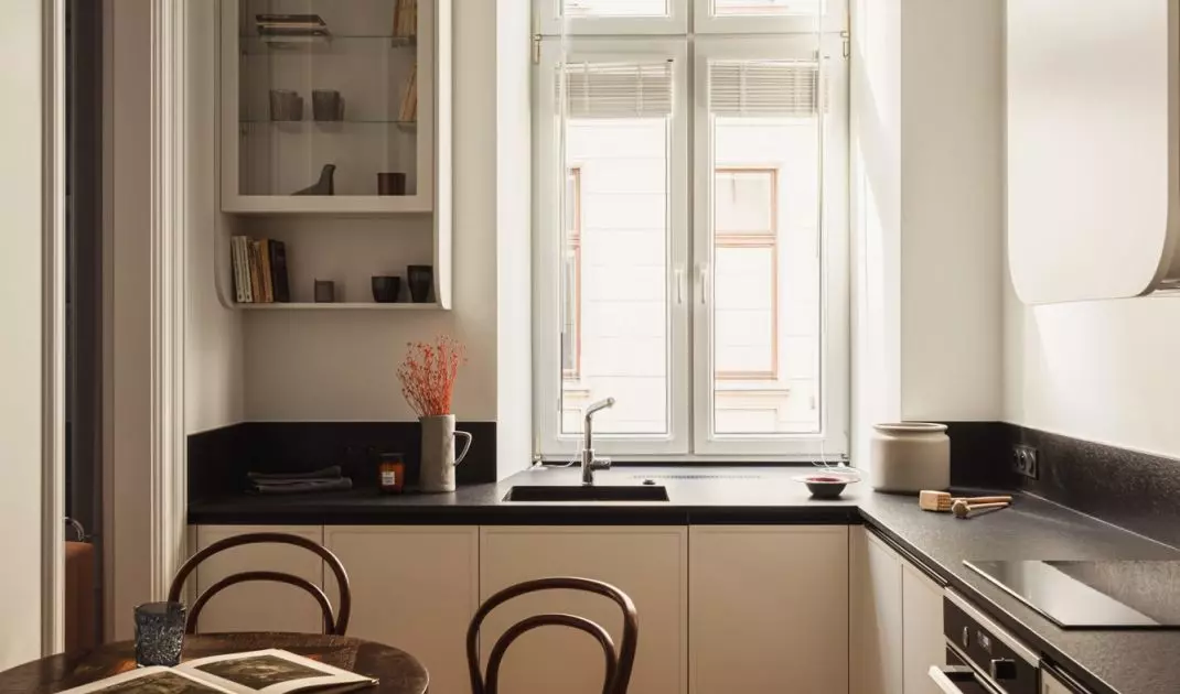 The kitchen has been brought closer to the living room