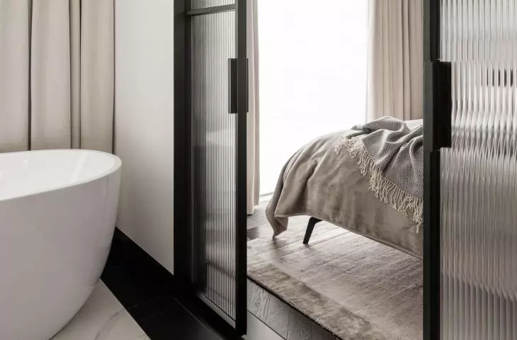 Ornamental glass was also used in the sliding door leading to the bathroom
