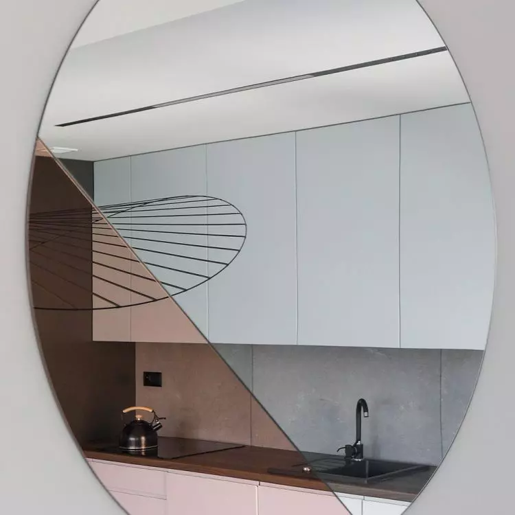 The use of a mirror provides an interesting visual effectn