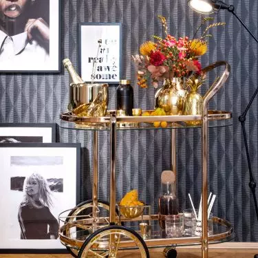 A bar on wheels is an accessory taken directly from hotel equipment