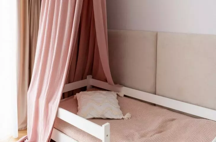 Pink canopy gives the interior a fairy tale feel