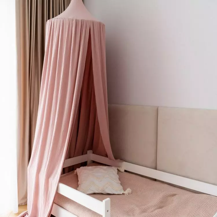 Pink canopy gives the interior a fairy tale feel