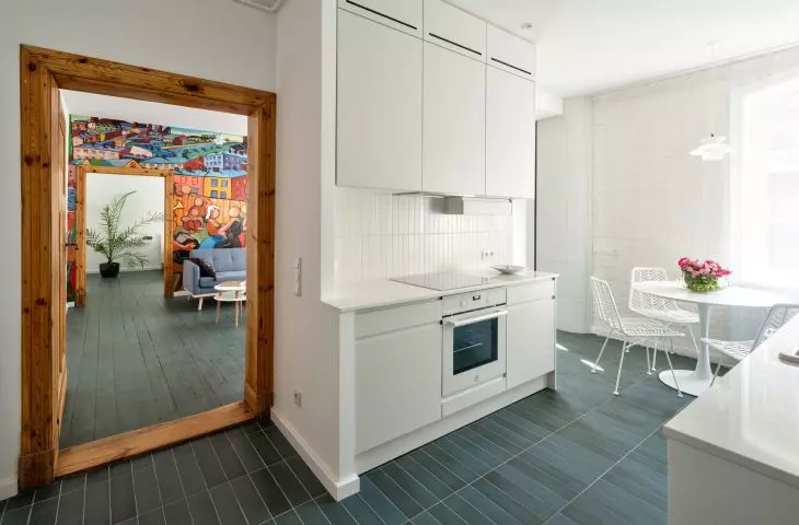 Sparrow painting-inspired murals bring color to subdued setting