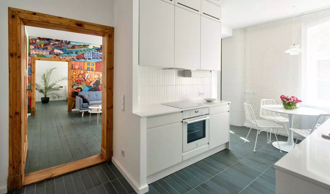 Sparrow painting-inspired murals bring color to subdued setting