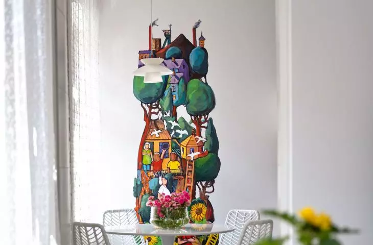 The second mural adorns a wall in the kitchen and dining room