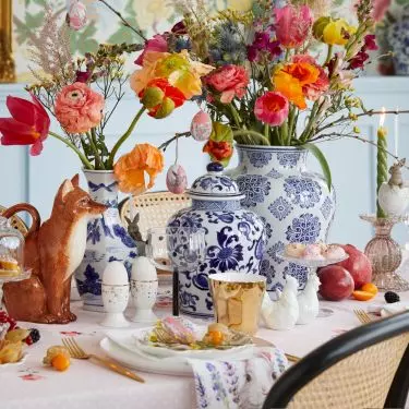 Floral patterns and ornate candlesticks will create a granny chic style arrangement