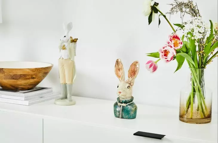 Place a figurine of a hare resembling a fairy tale character on the dresser