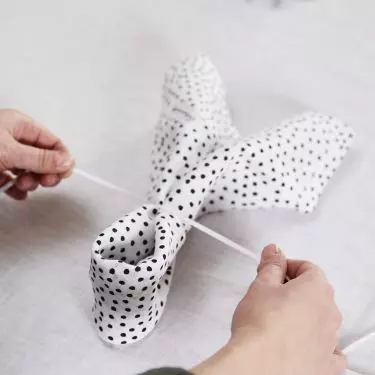 Rabbit ears made from doilies are very easy to make