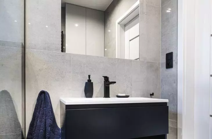 Grant details make the bathroom design fit in with the rest of the interior