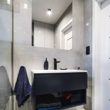 Grant details make the bathroom design fit in with the rest of the interior