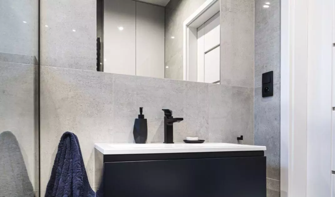 Grant details make the bathroom design fit in with the rest of the interior