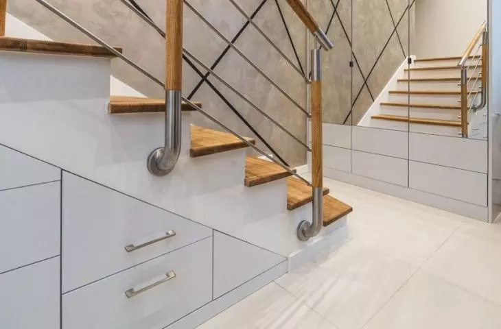 The architect used the area under the stairs to create additional storage space