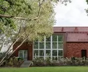 Architects designed large storefronts overlooking the garden