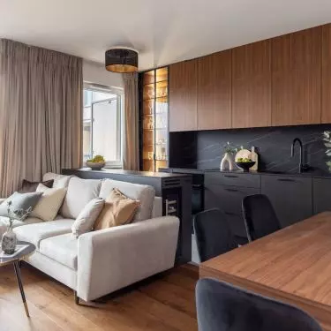 The open-plan living area consists of a kitchen, dining room and living room